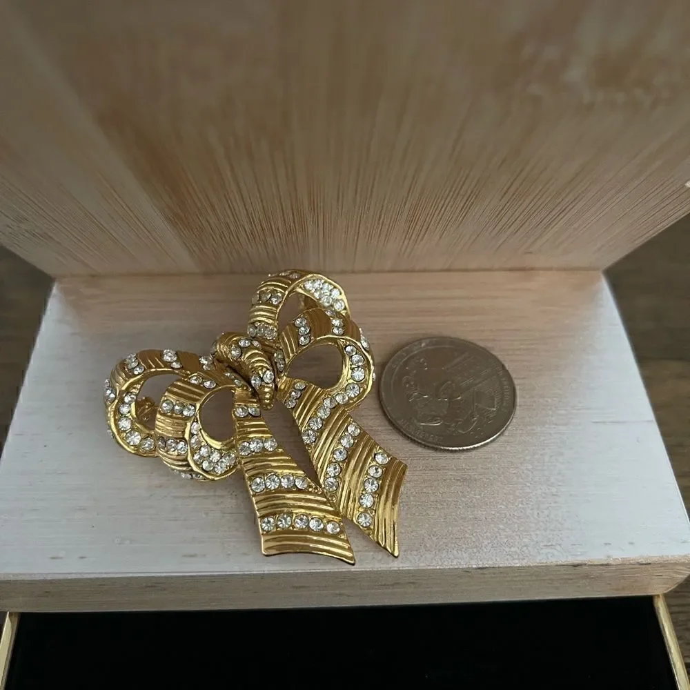 Gold tone vintage cz bow statement brooch